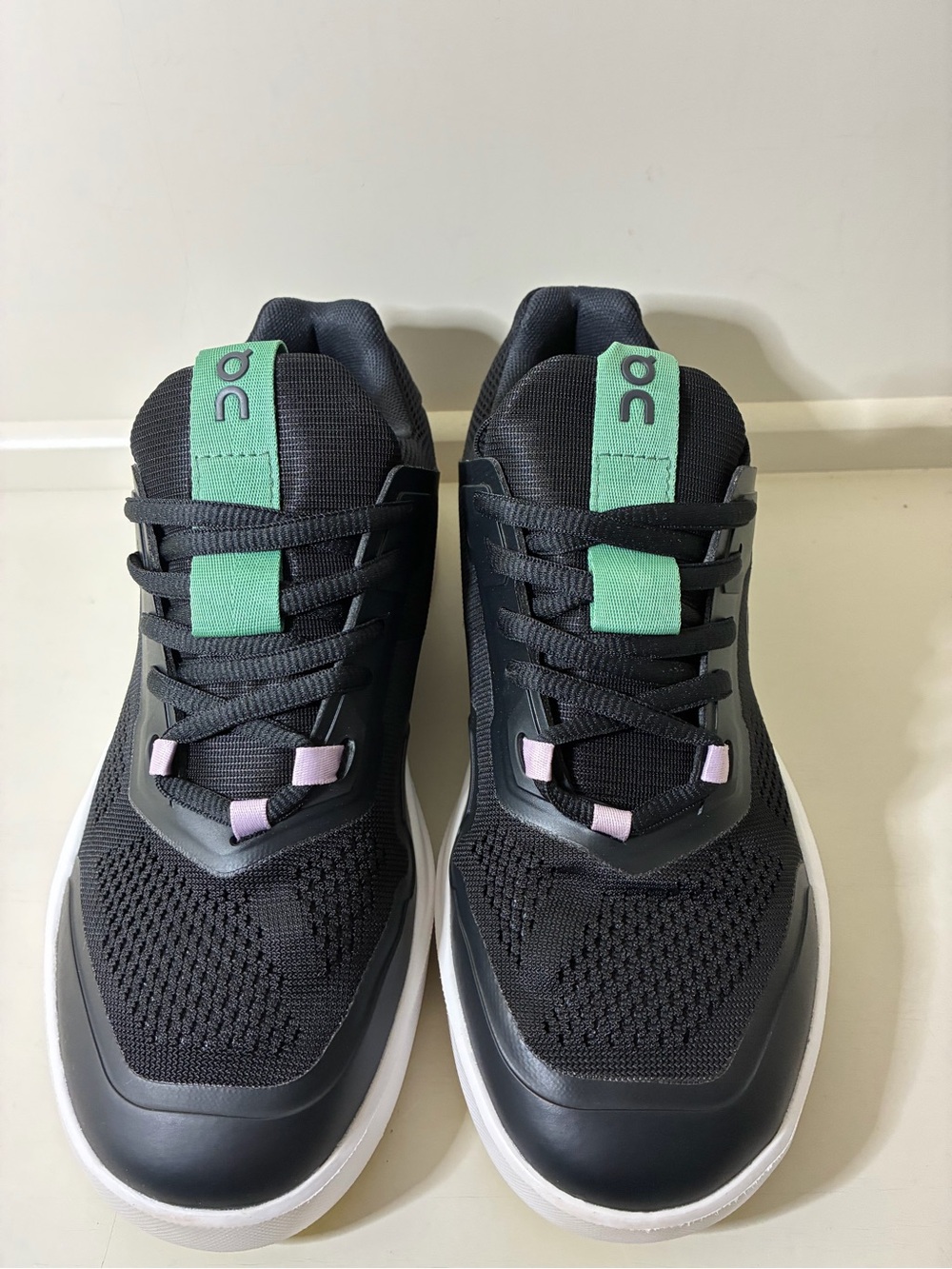 On Running Women’s Black Sneakers with Mint and Lilac Accents